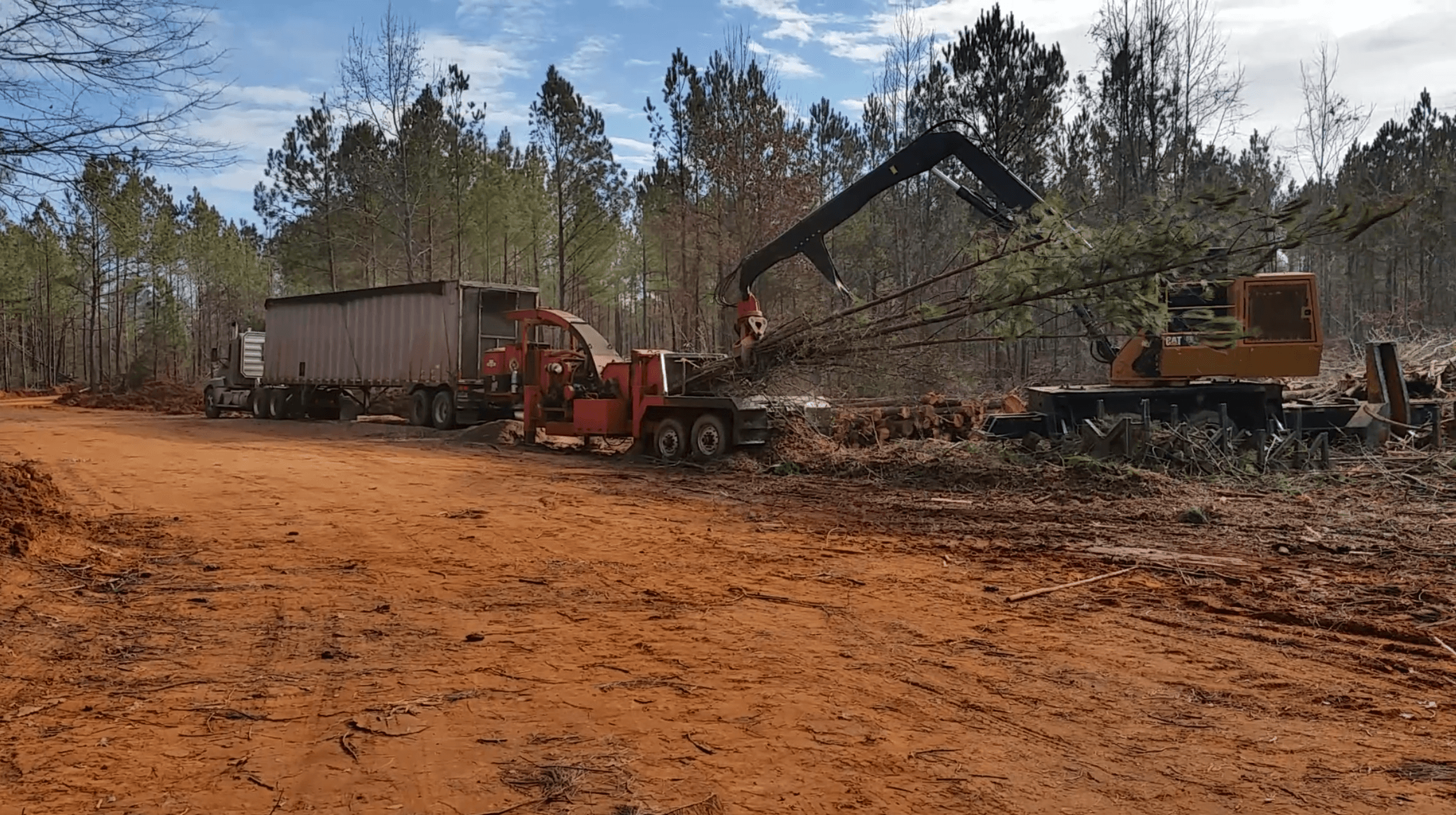 In-field pine log chipping operation in Georgia.
